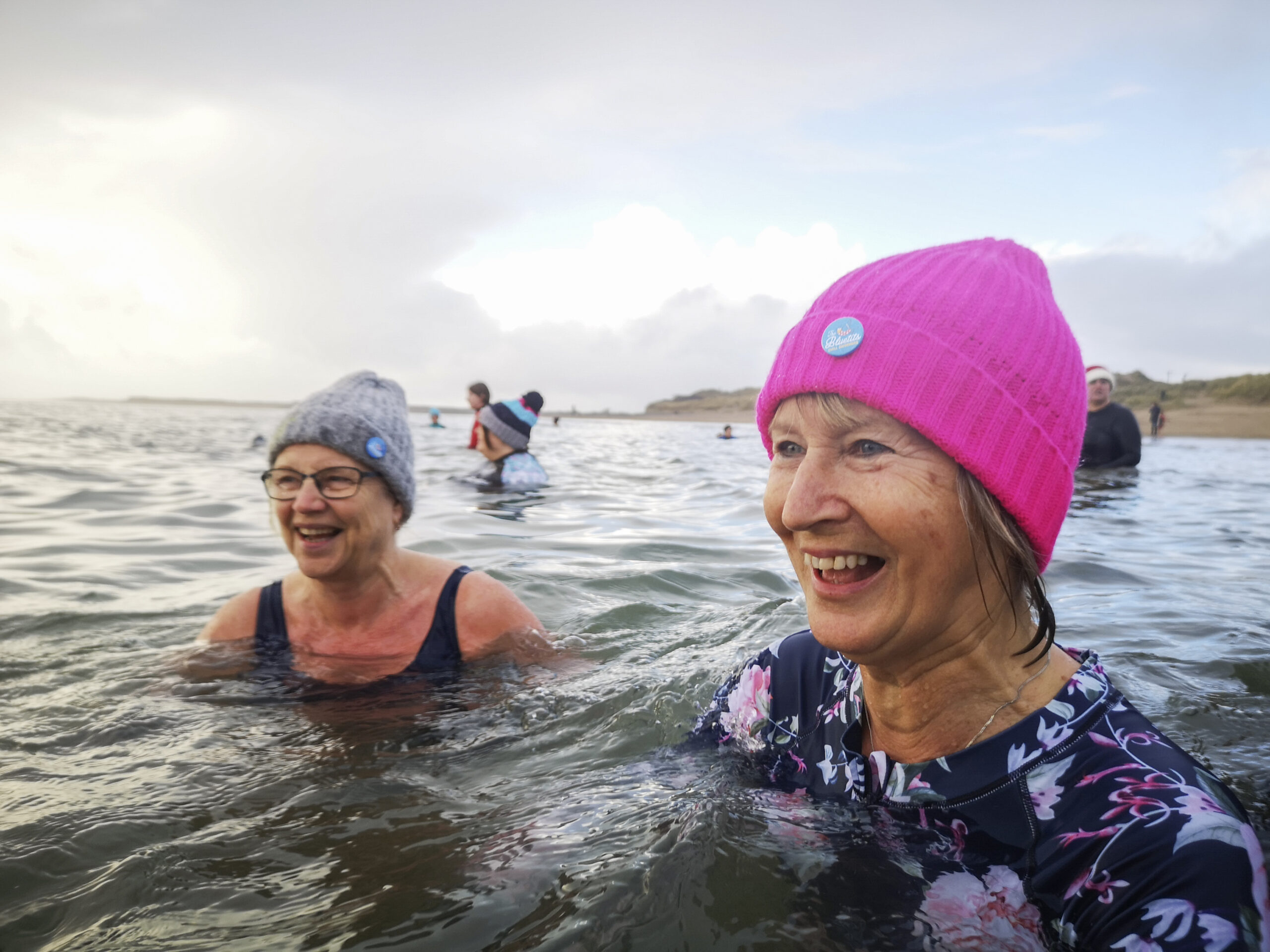 middle aged women enjoy a swim in the sea