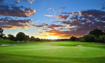 Sunset over golf course with stunning cloud formation and colors