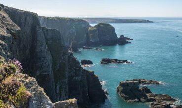 The panoramic view of rocky cliff along the coastal of Holyhead in Wales.