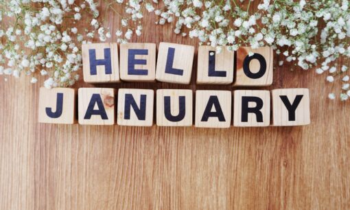 hello january written on scrabble tiles.