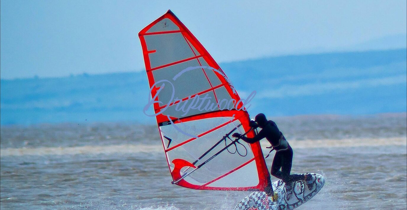 someone windsurfing