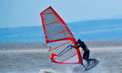 someone windsurfing